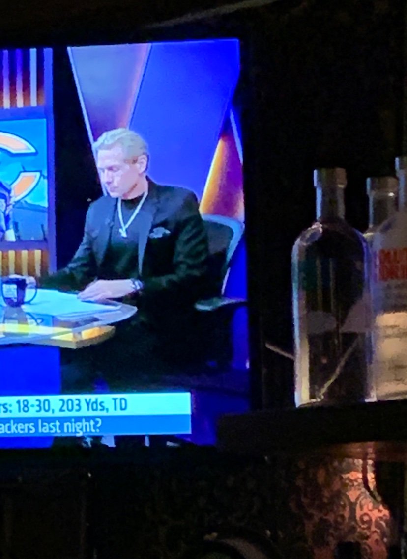 writtenlow's tweet photo. Skip Bayless is dressed like that Kids in the Hall sketch where Kevin gets a minor promotion from mail clerk and instantly goes mad with power #GenXcontent https://t.co/L063TcrJYF