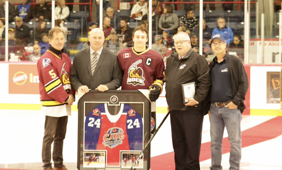 Timmins Rock captain <a href="/derekseguin19/">Derek Seguin</a> being presented his game worn Team CANADA jersey from last years @HC_WJAC before last night’s season opener. 
Photo Credit: Andrew Autio @ @tubetimmins
