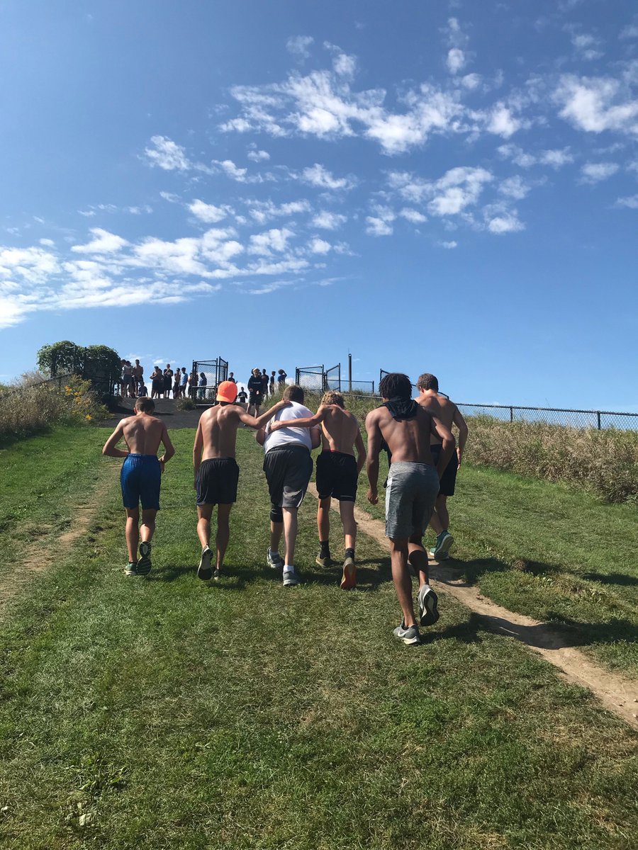 PSHSCougarsXCTF's tweet photo. The best moment of this morning's workout at Blackwell Hill.  A new freshmen being helped and cheered on by his senior teammates and the rest of the TEAM.  This is why I love coaching. #TheCRC #WeLoveHills #BlackwellHill #Family #CougarCulture #WyattWonToday https://t.co/jaLsvkgXil