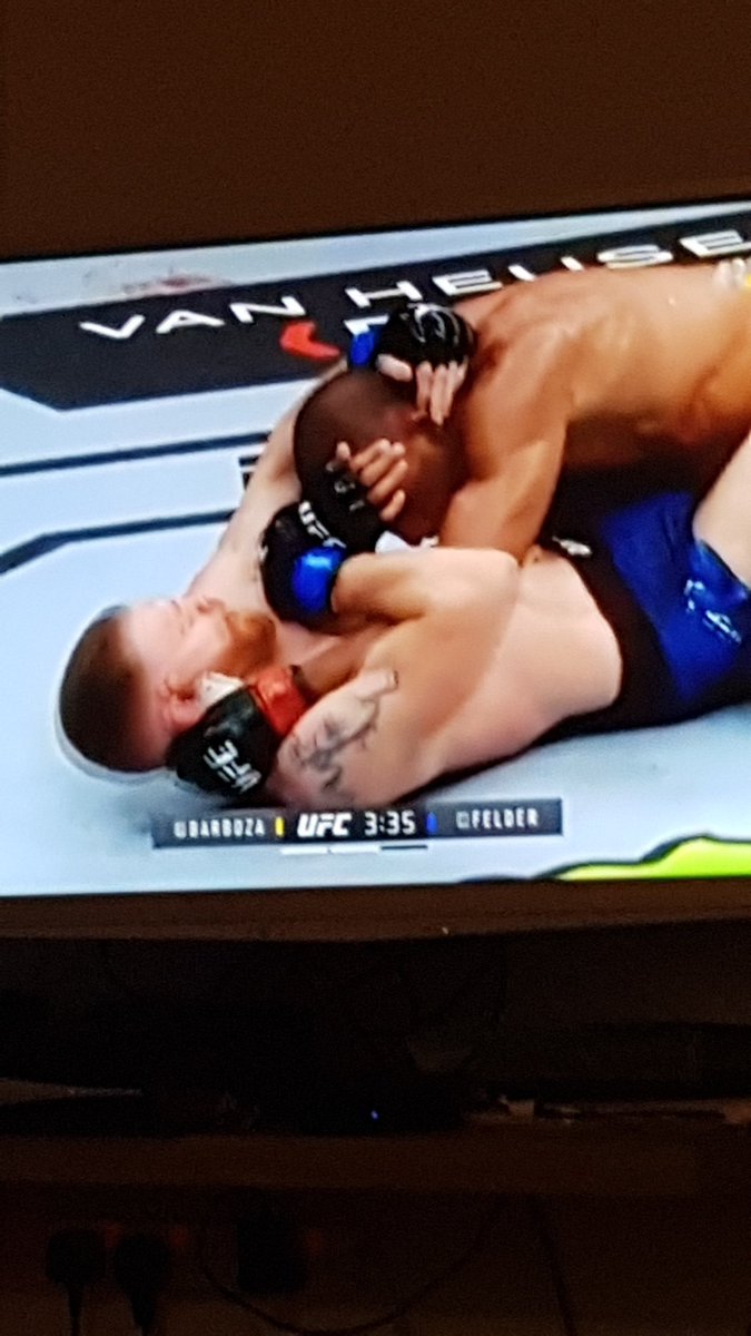Troll52578329's tweet photo. @Ufc Felder vs Barboza brutal fight, Felders face looks really bad at the moment lets hope the cut man can do him a solid.  #InAbuDhabi https://t.co/RPOYdZONfK