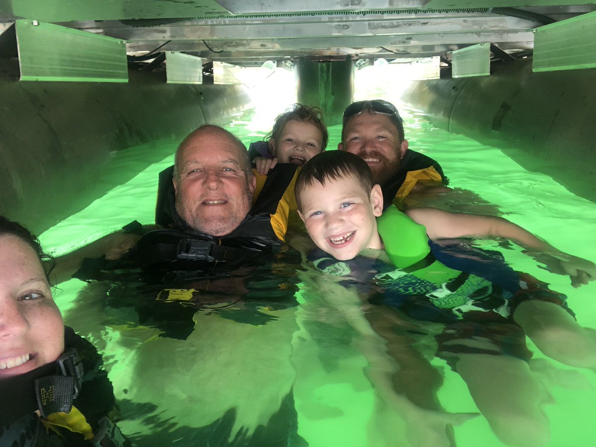 Weekend at the lake. #nofilter #glowingwater We are under the pontoon boat!