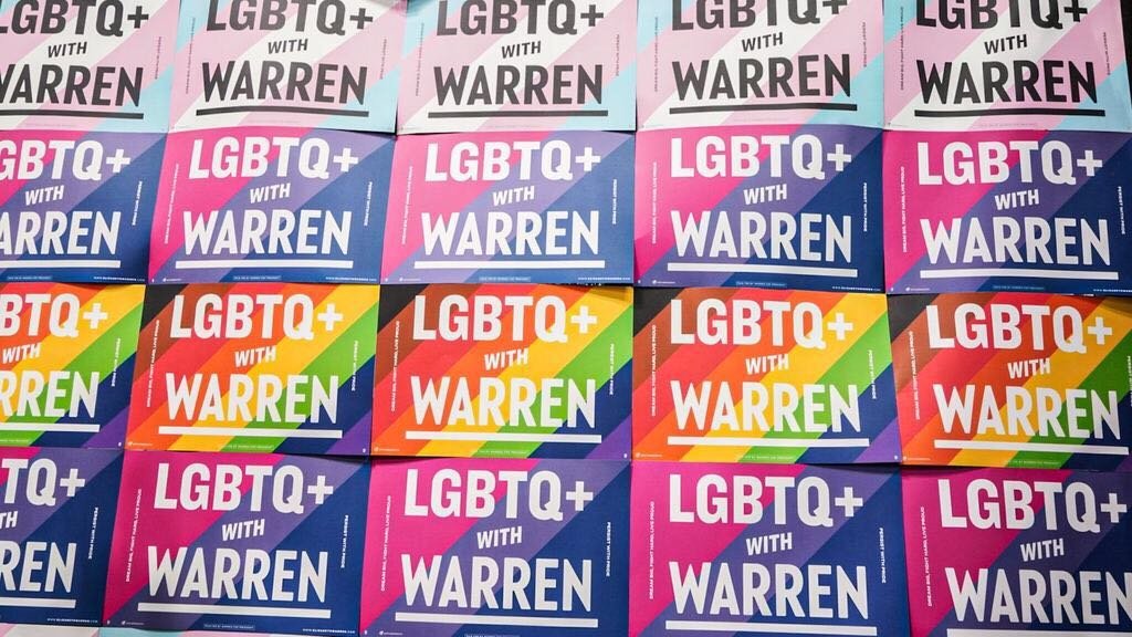 LGBTQ+ With Warren signs. 