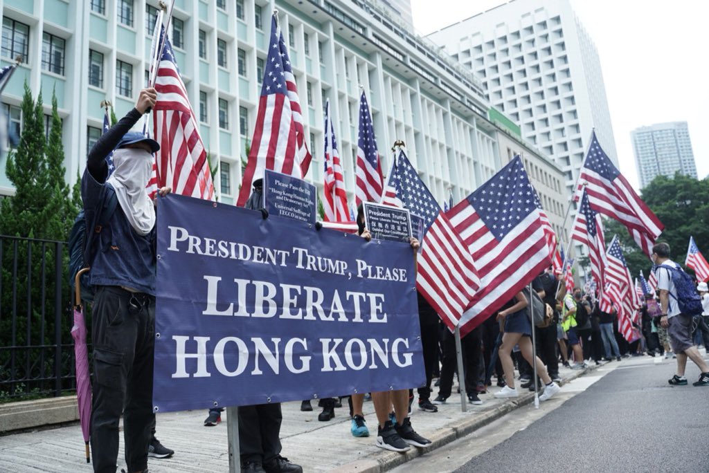 hkfp's tweet photo. The #HongKong Human Rights and Democracy Act would grant powers to Washington to sanction officials responsible for suppressing rights and freedoms in Hong Kong.
In full: https://t.co/kmLJLFCnSX. Photo: InMedia. #hongkongprotests #antiELAB https://t.co/YBZg7N2eAk