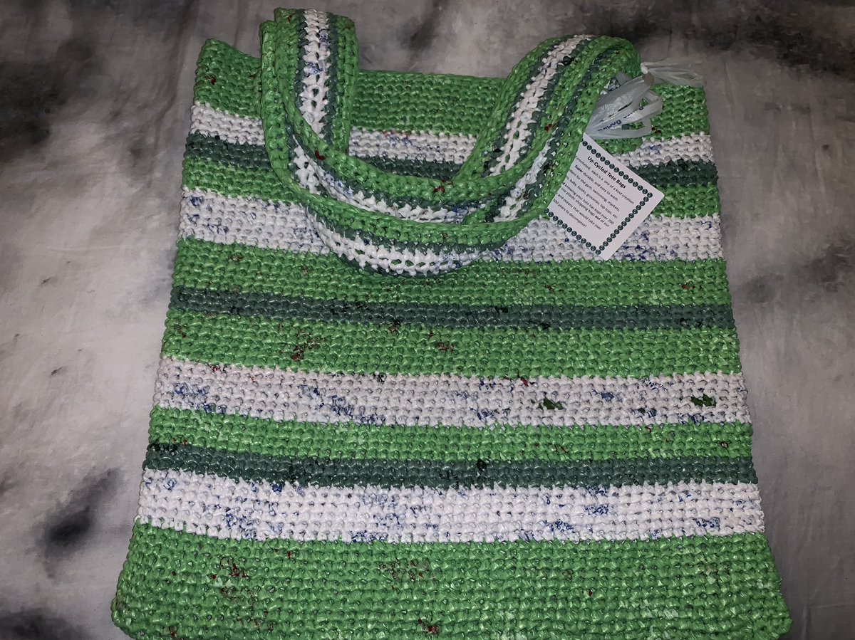 abriastevens's tweet photo. My great grandma makes these bags, every plastic bag she gets from the store and from family members she cuts them into a line and rolls them up in a ball like yarn and then crochets them into bags. If you are interested in one please DM me. https://t.co/kbGa8A0F9H