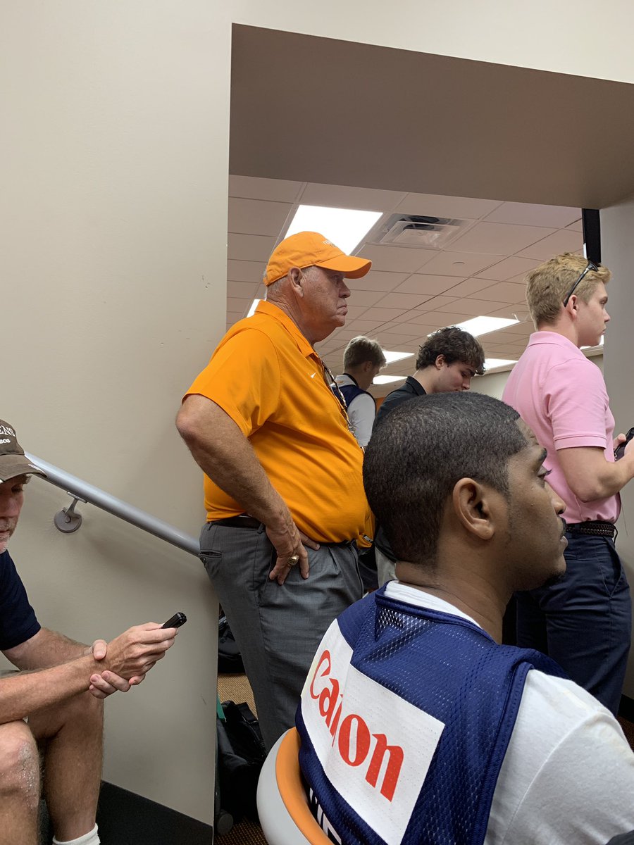TreyWallace's tweet photo. Tennessee AD, Phillip Fulmer watches on during the Jeremy Pruitt press conference. #Vols https://t.co/ejR84pwLeL