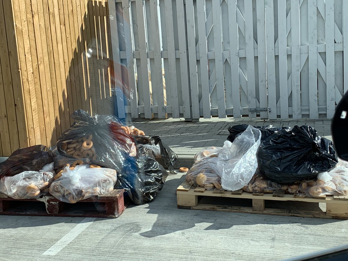 SejalSachdev's tweet photo. Saddened to see this outside the @krispykremeUK factory In Watford. Surely they could’ve been donated or at least put in the bin, not dumped like that?! #foodwaste #appalled https://t.co/ehzX3m1zxw