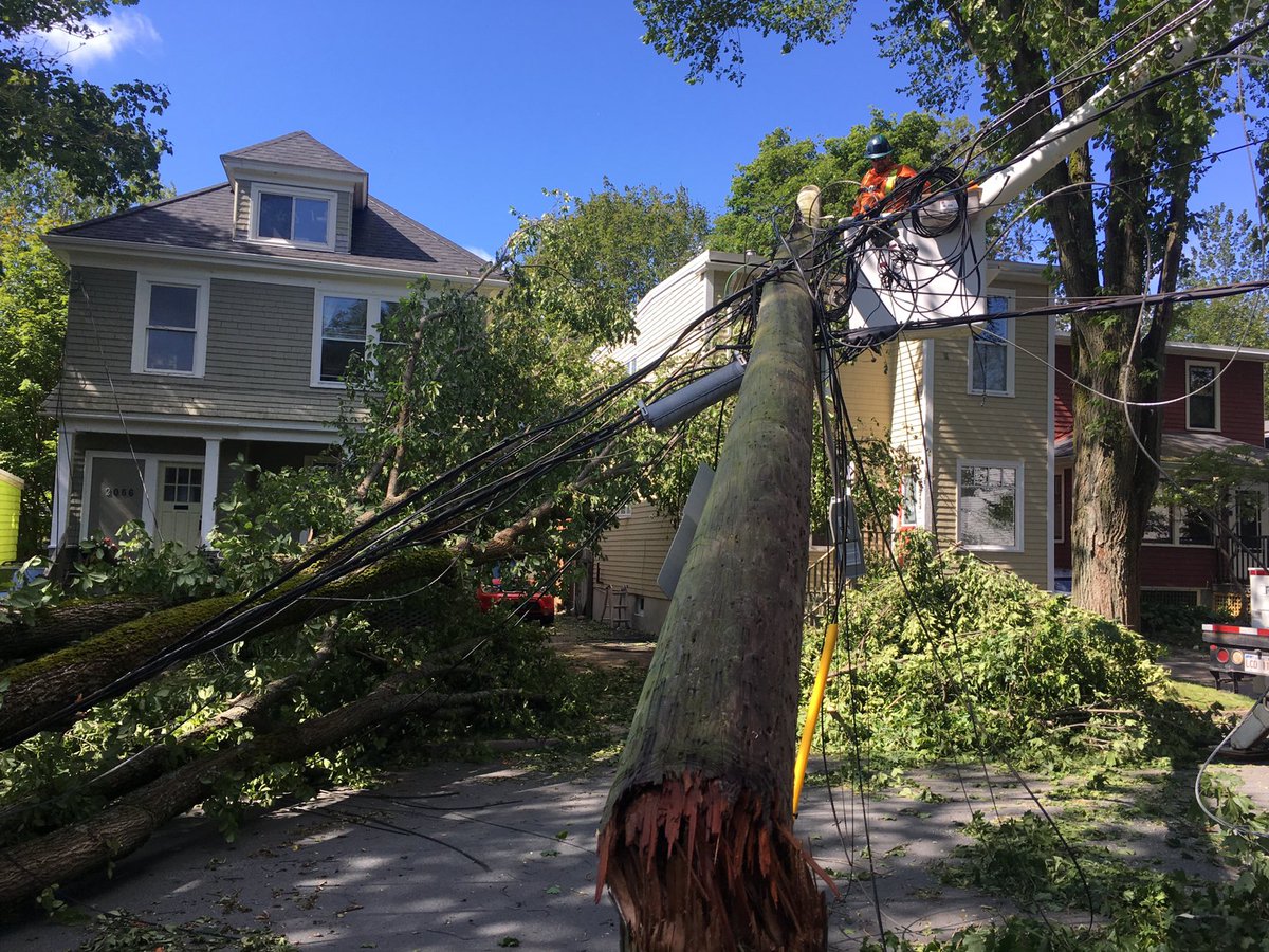 nspowerinc's tweet photo. Power line technicians and forestry crews working on repairs in West End Halifax. As we continue to assess damage we’ll be updating our estimated restoration times on our outage map. Right now we’ve listed broad estimates—these will be refined as our crews are on the scene today. https://t.co/CXJmG5JJGk