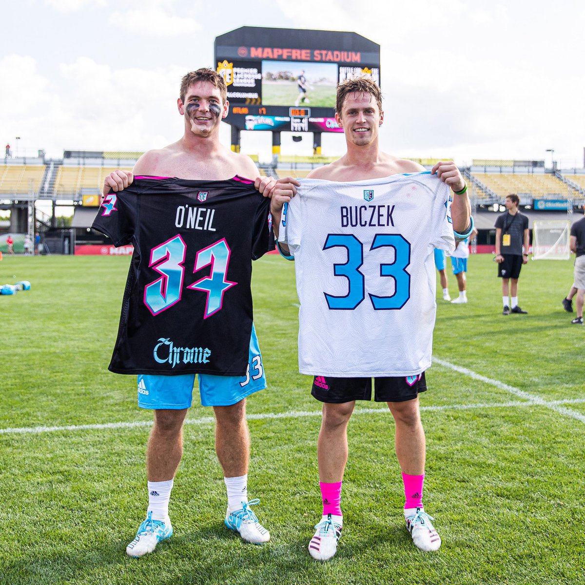 CornellLacrosse's tweet photo. After breaking the @PremierLacrosse record for most points in a single game, Coach Connor Buczek ‘15, MBA ‘17 swapped jerseys with his Big Red teammate Mike O’Neil ‘14. #33 #37 #bigredbeauties #ninegoals #ninestitches #WD>WS #LGR https://t.co/bAbM67WtDb