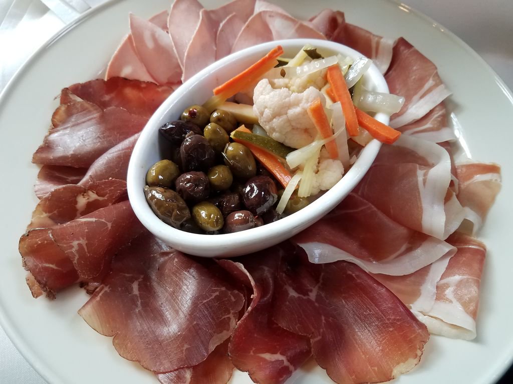 Start your #SundaySupper with something perfect for everyone! Our Salumi Misti features a selection of cured meats, roasted olives, and giardiniera.