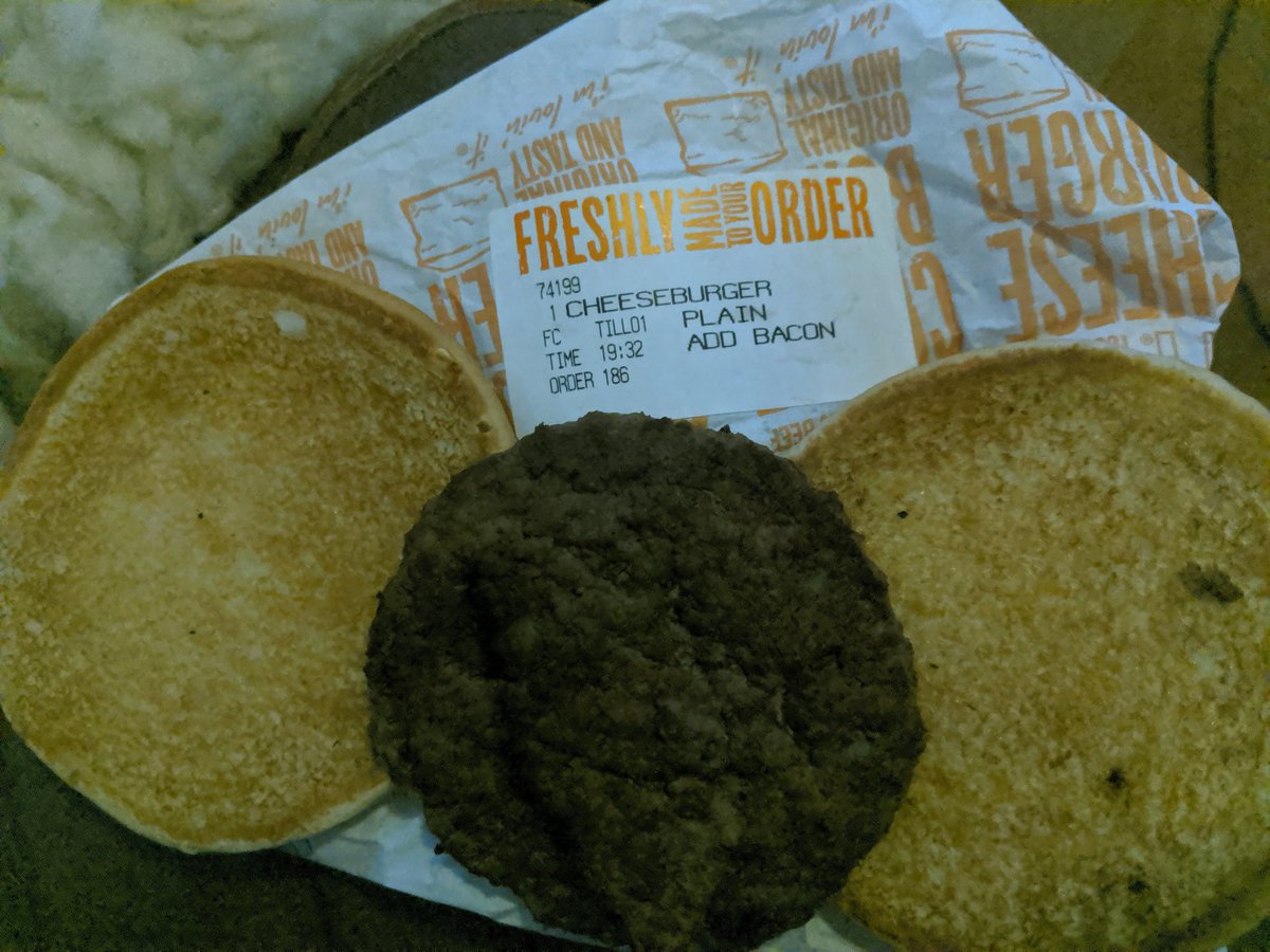 CyberJodie's tweet photo. @McDonaldsUK now this cheeseburger I ordered via @ubereats_uk doesn't look like it has extra bacon or the cheese it was supposed to come with, does it? https://t.co/iMVQXqA3fS