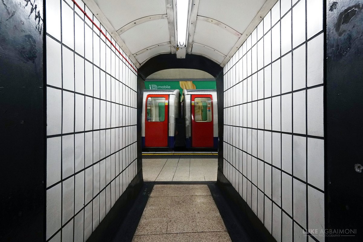 LONDON UNDERGROUND SYMMETRY PHOTO / 37CHARING CROSSNot perfectly symmetrical, but a very pleasing train alignment shot.  http://instagram.com/tubemapper   http://shop.tubemapper.com/Charing-Cross/ Photography thread of my symmetrical encounters on the London UndergroundTHREAD