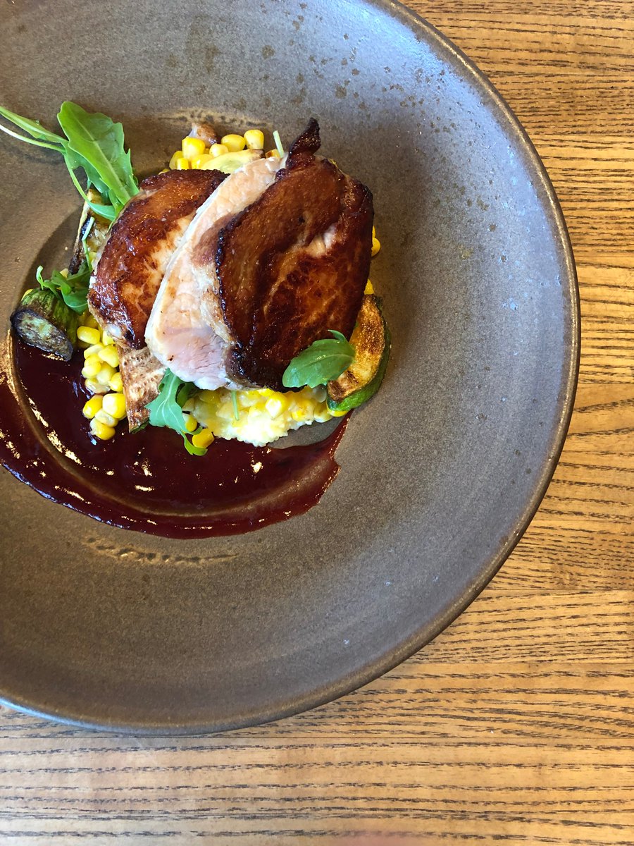 LlanoSeco's tweet photo. Check out @CassavaSF #llanoseco pork chop with polenta, saffron-plum jus with corn and summer squash. https://t.co/RAnw8guwM9