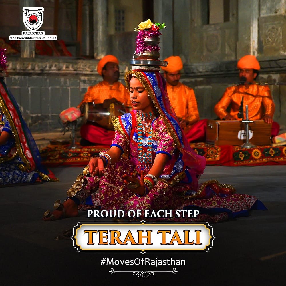 my_rajasthan's tweet photo. Terah tali is a traditional dance form performed by the Kamar tribes. Manjiras (small metal cymbals) are tied to different parts of the body & women sit on the ground to perform it. Sometimes, a small sword is held between the teeth and an ornamental pot is balanced on the head. https://t.co/TLs9U5KTgY