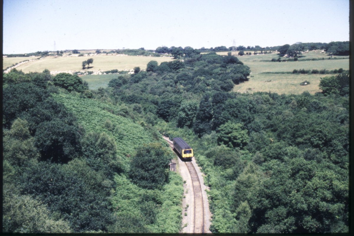 Tarka_Man's tweet photo. #ThrowbackThursday we look back at this day in 1989 with a Bubble car on the Newquay branch line in Cornwall from the #Treffry Viaduct near Luxulyan @DCRailPart @GWRHelp @railscot https://t.co/PjzADgskz6
