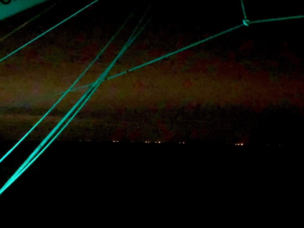 Land!! The lights of Long Island and New York City ahead.