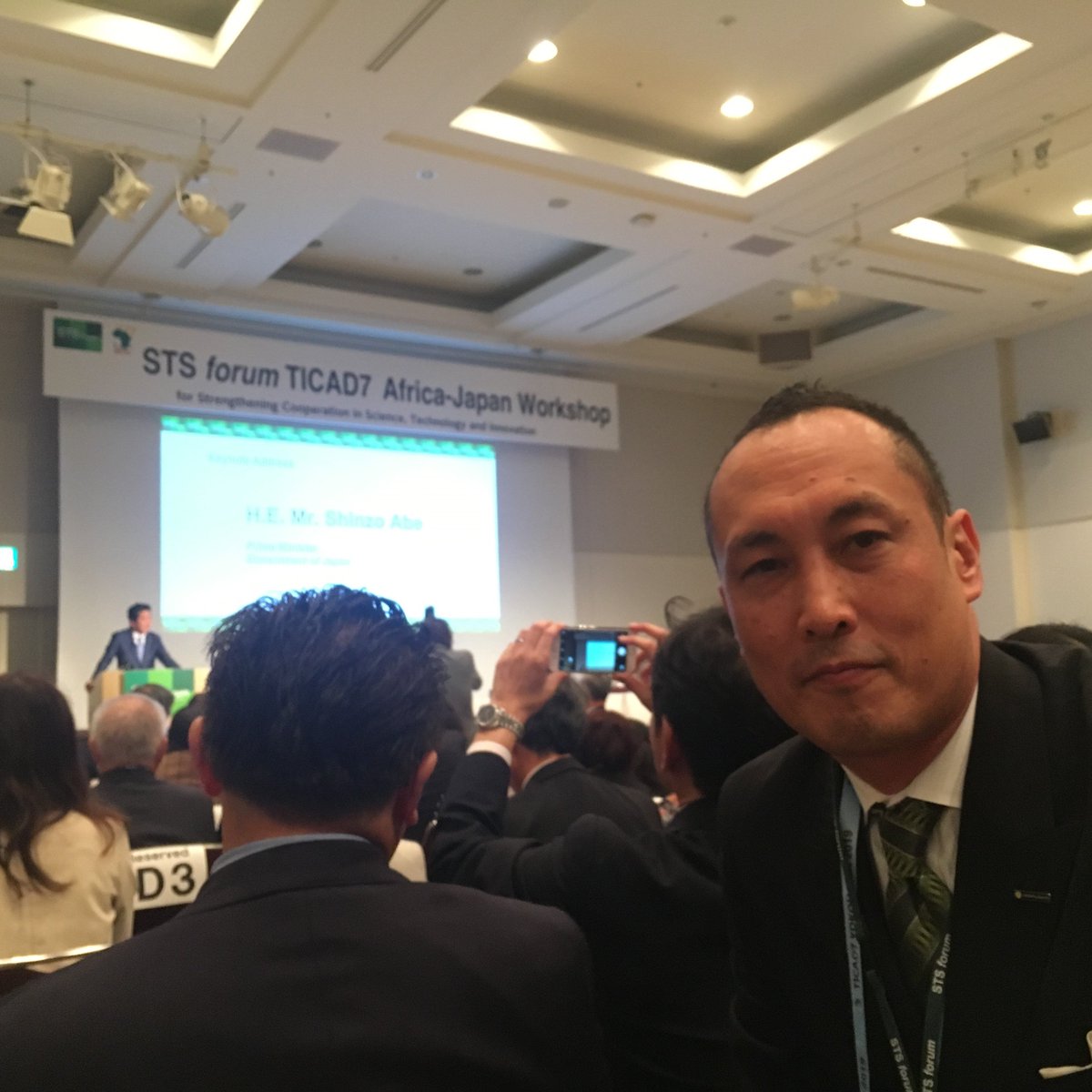crownagents's tweet photo. We're proud to be at #TICAD7, alongside over 30 African Heads of State. Today, Ei Yamashita, President of @crownagents Japan, attended Japanese Prime Minister, Shinzō Abe's opening speech. Later, our Chair  @mariestaunton caught up with Akinwumi Adesina, President of @AfDB_Group https://t.co/Z4CO3OBl3X