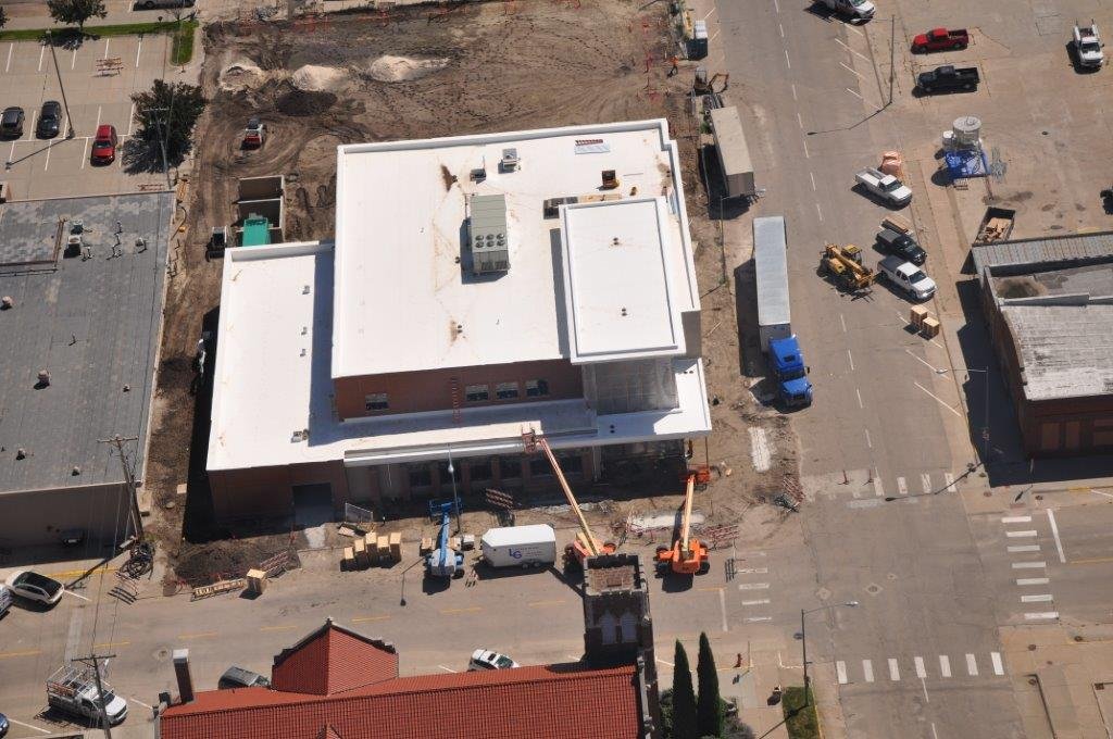 Columbus_NE_PD's tweet photo. The Police Department is coming together! Check out the progress from the air! Thanks @huskerheli #CPDcomingtogether #newCPD #community https://t.co/qHKDXlL5XQ