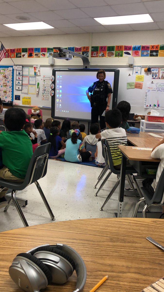 Officer Schmidt teaching first graders about why we have rules and laws 😁 #PBL #falconsmatter