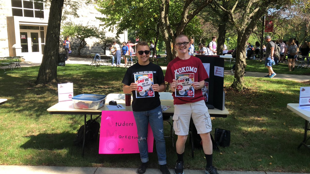 Come to our booth where you can get free pizza and cornhole!