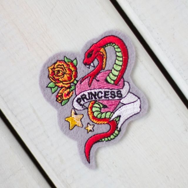 Bring out your wild side with this Princess snake tattoo motif! ⁠
⁠
This would look great on a denim jacket or to patch up a hole on an old garment.⁠
⁠
#careandrepair #irononpatch #snaketattoo #patchgamestrong #patch⁠
 #mending #visiblemending #s… ift.tt/2Zn2Arp