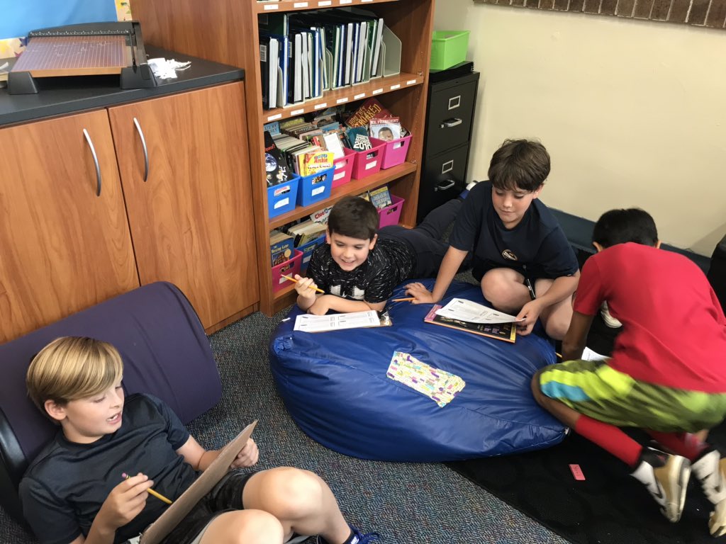 Lesniewiczd70's tweet photo. Working together to figure out what genre the text could be. #d70raptors https://t.co/fC30mefJ1O