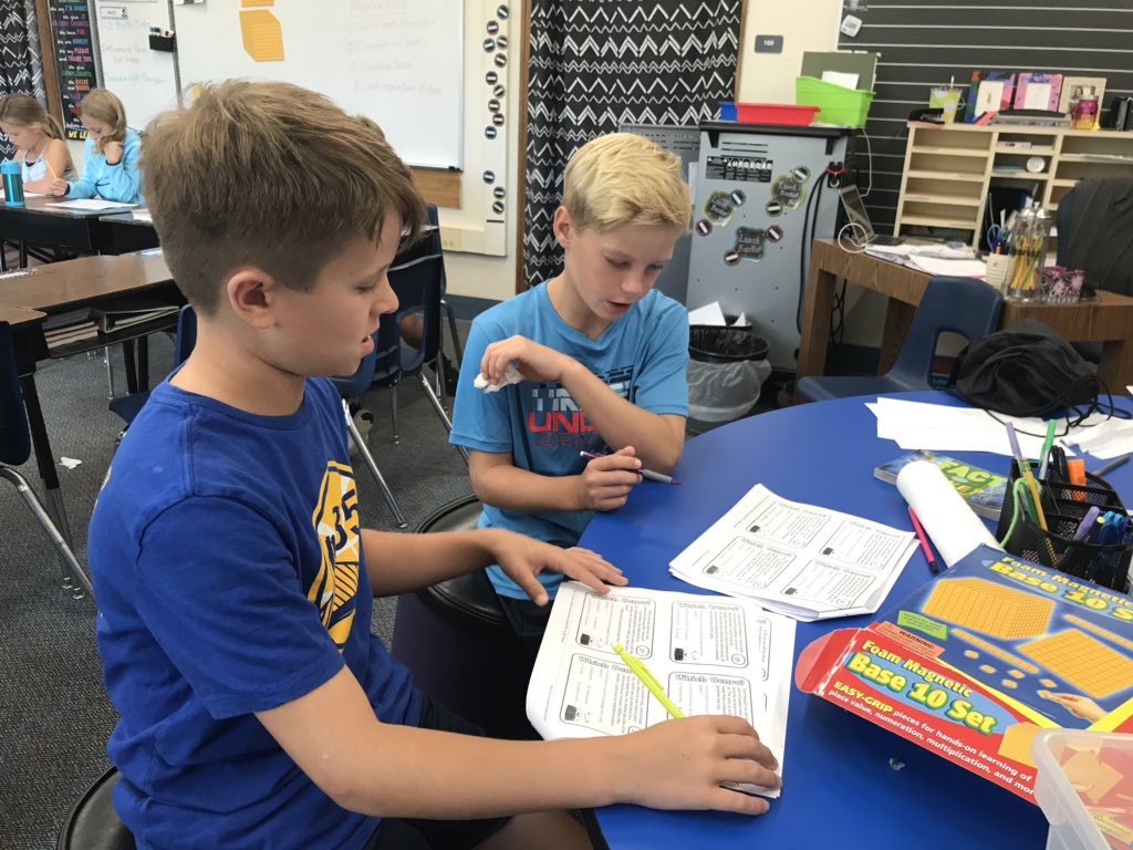 Lesniewiczd70's tweet photo. Working together to figure out what genre the text could be. #d70raptors https://t.co/fC30mefJ1O