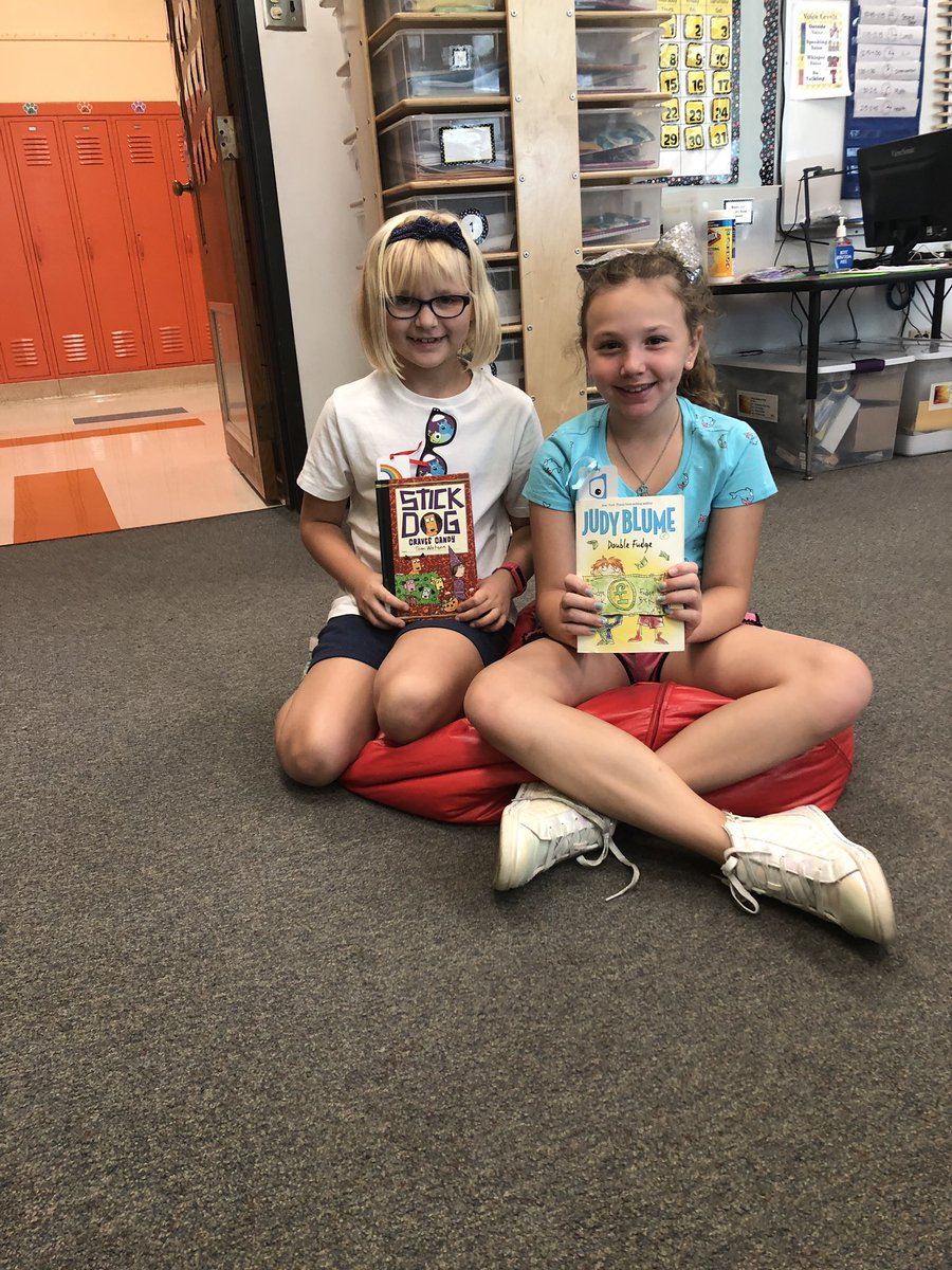 First week of school! Playing a place value math game and building our reading lives with our reading partners #EngageD64