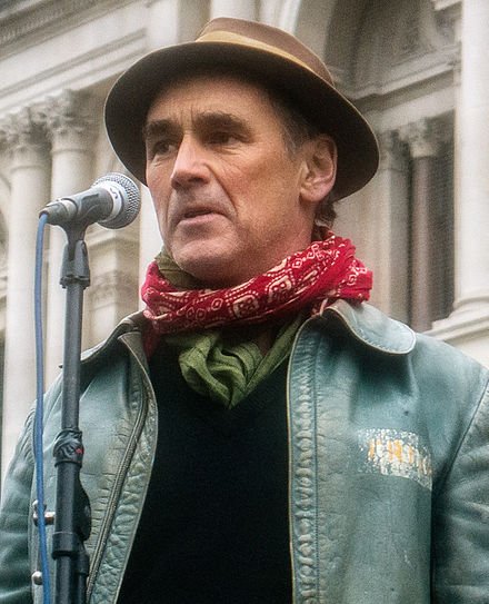 ENGLAND 2024Addressing a bewildered crowd at the Canterbury Festival, Mark Rylance defends the Free Wales Army's recent bombing of Shakespeare's Birthplace, urging his listeners to think of "that man from Stratford" as "naught but a satyr to Bacon's Hyperion."