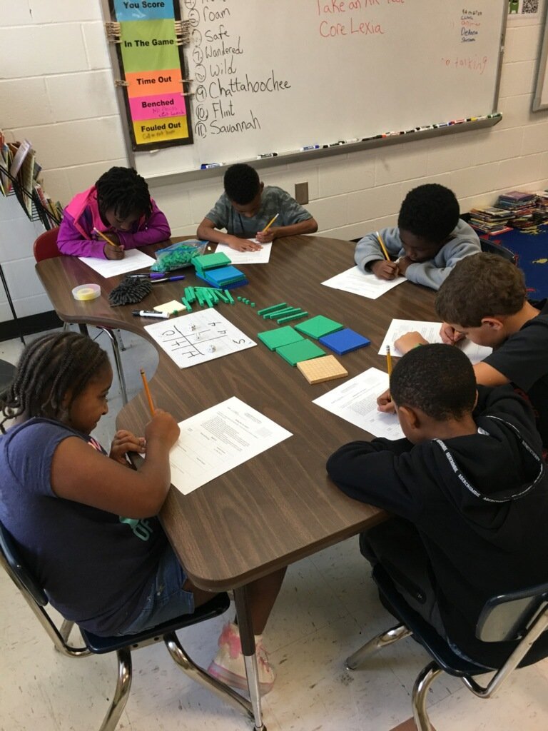 2ndHte's tweet photo. Mr. Roach's class @HTEschool is excelling at the GA DOE Frameworks task on Building Base Ten Numbers. #augustmathchallenge @ByrdTeaching https://t.co/9ZWgmyAuuG