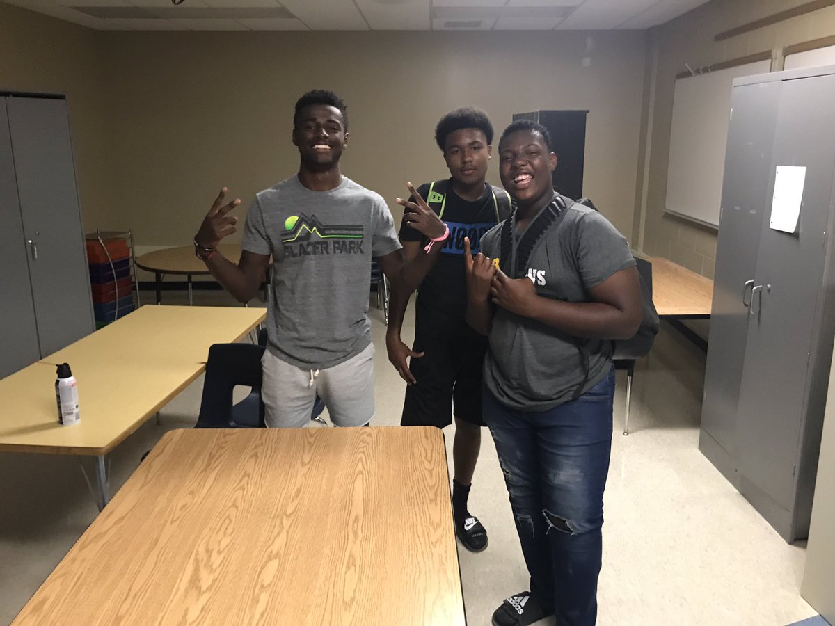 PrincipalLam's tweet photo. Problem solved!!! Table is in the room!  Thanks football players for helping the teachers move 😀 #TeamBrownDeer #movingstruggles https://t.co/zSwcqUAG6J