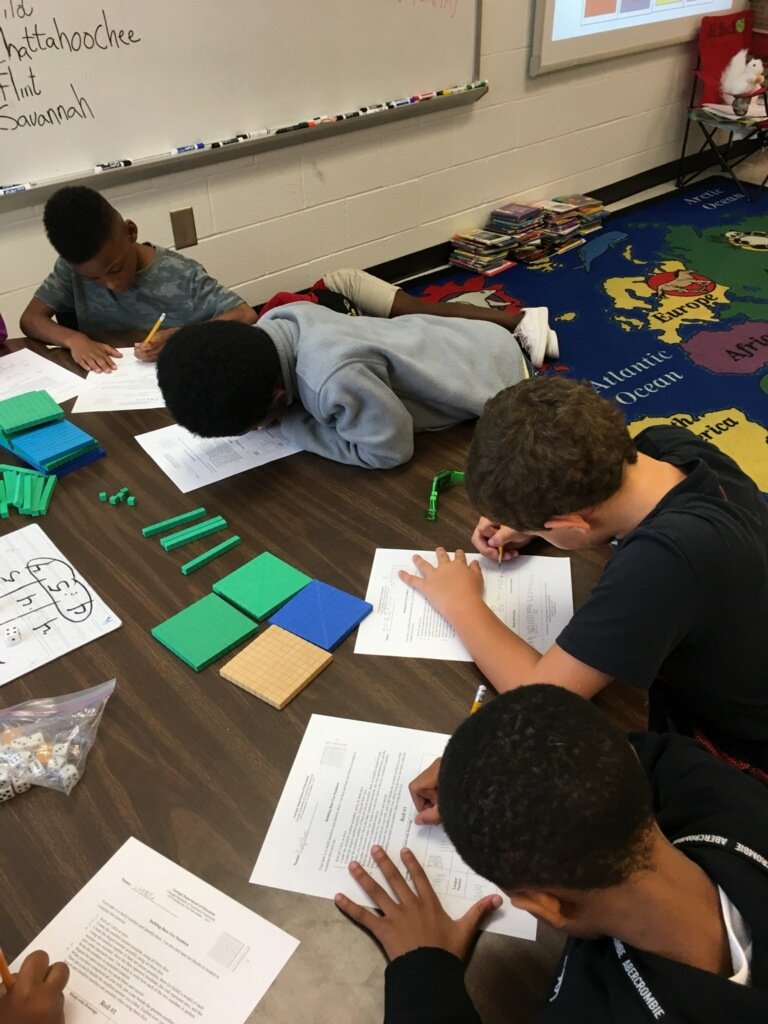 2ndHte's tweet photo. Mr. Roach's class @HTEschool is excelling at the GA DOE Frameworks task on Building Base Ten Numbers. #augustmathchallenge @ByrdTeaching https://t.co/9ZWgmyAuuG