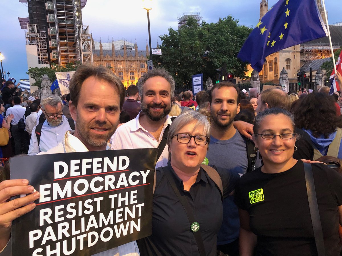 GreenRupertRead's tweet photo. With ⁦@TheGreenParty⁩ colleagues ⁦@scottainslie1⁩ ⁦@CarolineRussell⁩ ⁦@ZackPolanski⁩ and @talia_inreality outside Parliament, doing our bit to defend democracy...
#Proud
#WithDetermination.
#StopTheCoup! https://t.co/H7LuR0WDKm