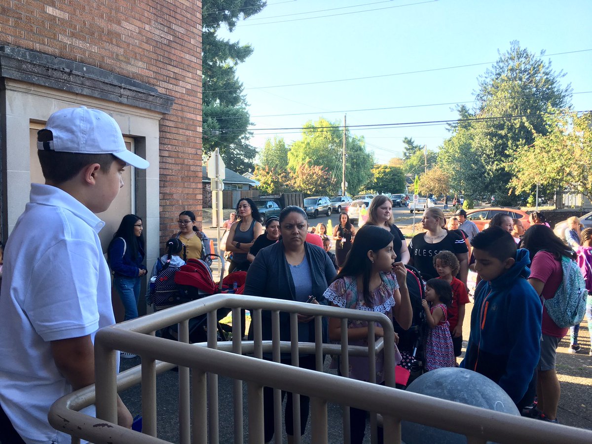 PPSConnect's tweet photo. Pacific Islander community leaders greeting students &amp; families at César Chávez. Thanks to Jason Trombley &amp; Mak Porotesano who are also Chávez alumni. #1districtPPS https://t.co/ux2FyXWVF5
