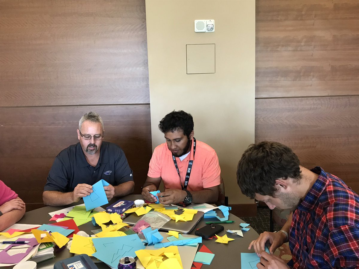 jenniferklawler's tweet photo. Middle school math teachers playing with the fold and cut theorem. You know theyโre engaged when you say to take a break and no one moves! #KUSDmath #KUSDLearn #flow #MTBoS #msmathchat https://t.co/h2TdnHd56N