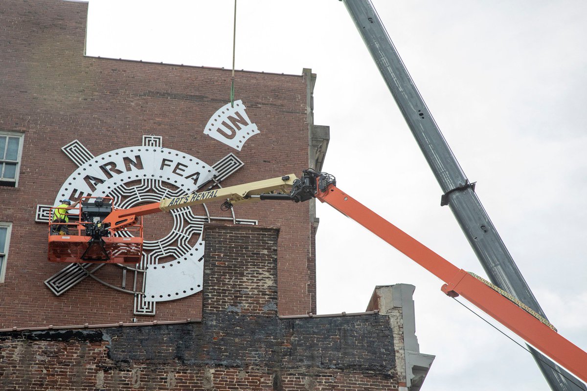 Transy's tweet photo. Transylvania professors Kurt Gohde and Kremena Todorova's #UnlearnFearAndHate halo was installed onto a downtown Lexington building Sunday. The piece is part of their communitywide art project, which began in 2016. (Photos: Gohde and Todorova) Read more: https://t.co/zYrrDq3PmZ https://t.co/NkdrMUmcx4