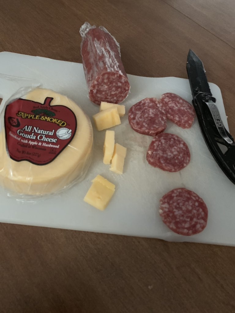When I’m feeling #bougie I eat smoked Gouda and dried salami with my pocke knife. #cheese #meat