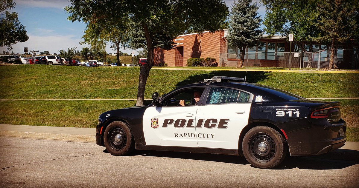 RapidCityPD's tweet photo. This'll be a common sight in the coming weeks as we give our school zones some extra attention. Remember to slow down around schools and be extra vigilant for students using the crosswalks. Let's all work together to keep our @rcschools students safe! #SafeRC #CommunityFirst https://t.co/OkBWX432OP