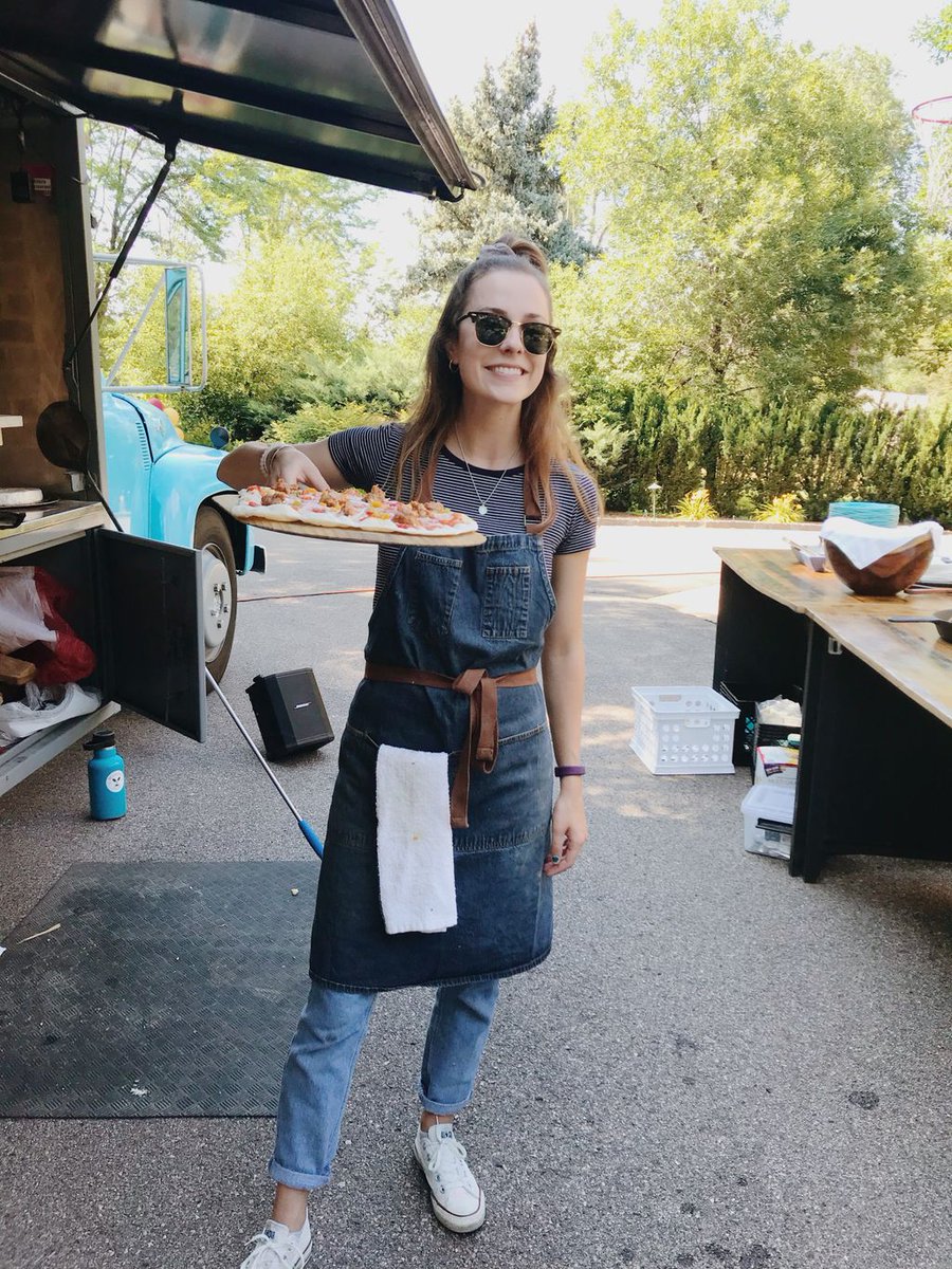 FritzKnoebel's tweet photo. This week's #whereweworkwednesday goes out to Jess, from the Class of 2020! Jess is currently interning for Mountain Crust Catering, a Fritz Alumni owned, local Denver caterer, cooking up some absolutely fire wood-fired pizzas! #FritzKnoebel #DUSummer #Pizza #DeliciousInternship https://t.co/T94awkS7NB