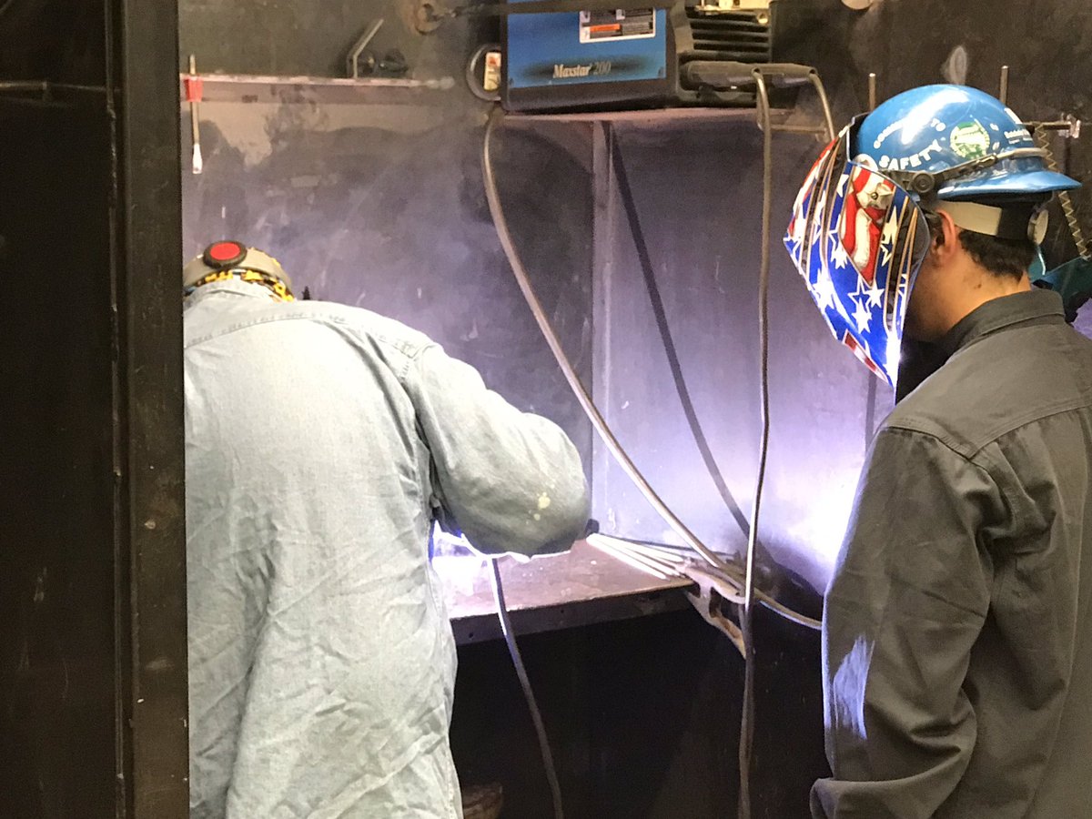 EPCOTWELDING's tweet photo. EPCOT welding 1st year students behind the hood @JCBOEal #Welding https://t.co/s4OfgRs8e8