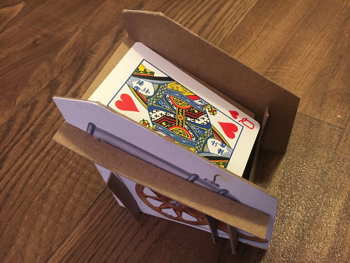 The "card cannon" lets you flick your card at the ship of the opponent who won the trick in the hopes of doing damage.