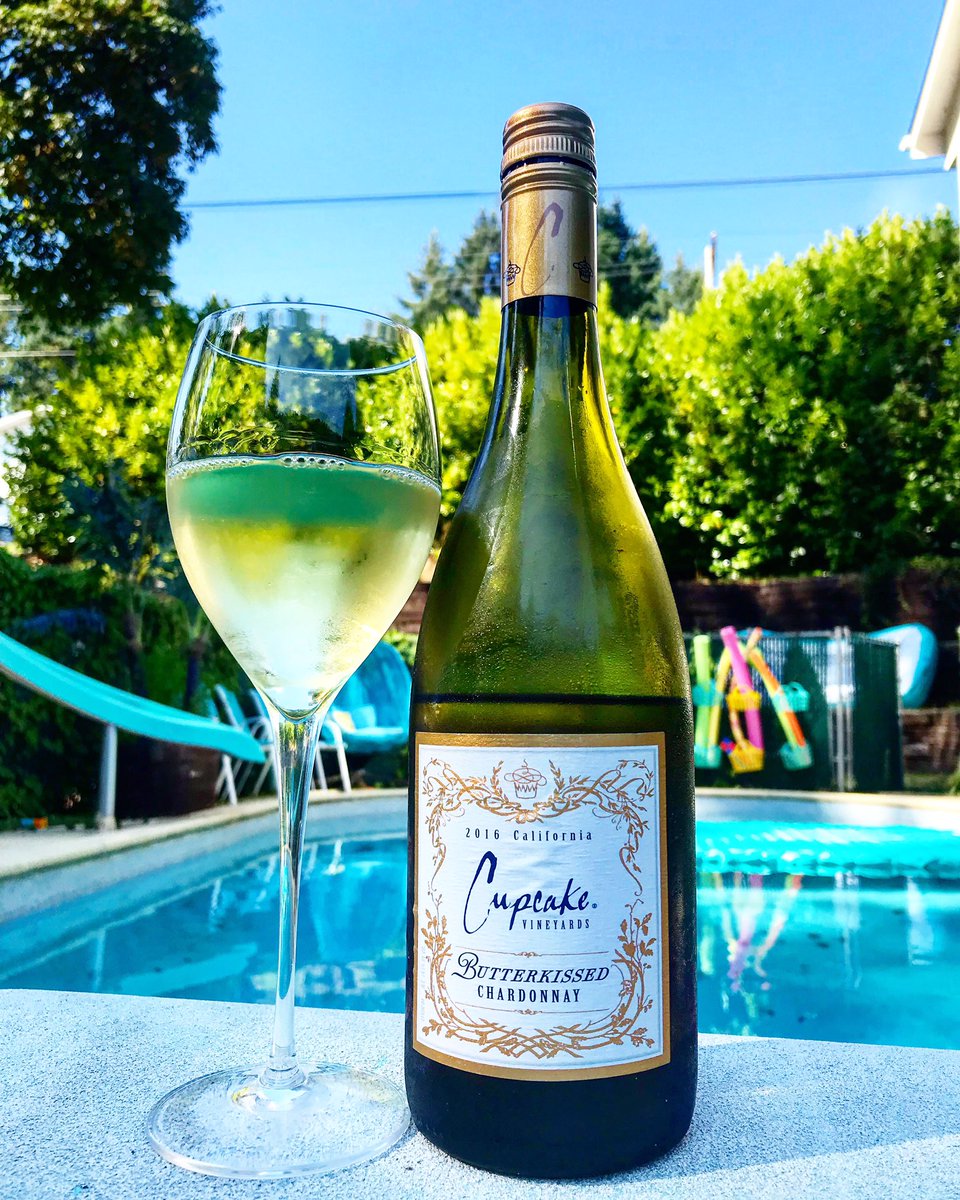 liquidlibation2's tweet photo. Summers not over yet! And I’m celebrating the day by the pool with Cupcake Butterkissed. It’s a Full-Bodied Chardonnay with tastes of buttery goodness hints of vanilla, ripe peaches and citrus notes. #liquidlibations #cupcakewine #summersnotover #winebythepool #winewednesday https://t.co/e7Wq6CjEFK