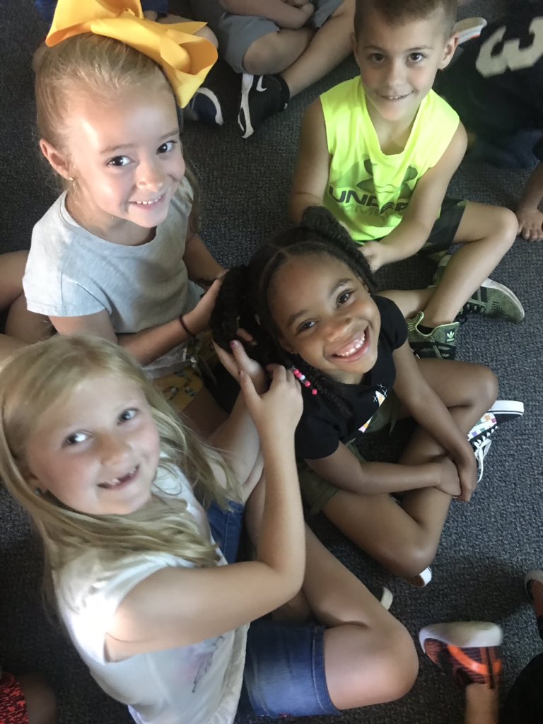 LandesJ's tweet photo. The first few days are under our belts. We love play-doh power buttons, learning to login and sign out, and even braiding hair! Look at these smiles! I have the best job. #LincPride  #lovinglongfellow https://t.co/qkgszuS7RQ