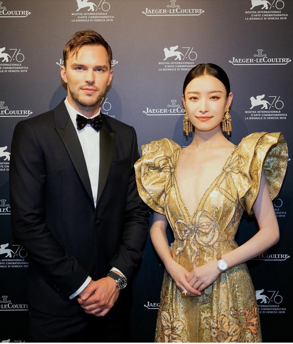 UpdatesNiNi's tweet photo. Ni Ni, pictured with Nicholas Hoult and dressed in Gucci, stuns at Jaeger LeCoultre at Venice Film Festival. 

#NiNi #倪妮  https://t.co/fnPUohhTQZ