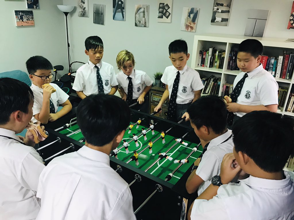 HHKSShackleton's tweet photo. Common room life at break time for the #boysofshackleton as they take a breather from the first action-packed Thursday of term! #boysofcourage #shackletonfamily @Harrow_HK https://t.co/8CEKmdOiOQ