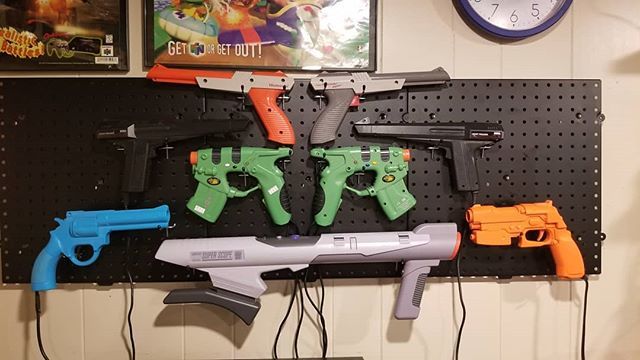 jerryterrifying's tweet photo. Check out these Weapons of Mass Destruction. #konamijustifier #guncon2 #guncon #nintendozapper #segalightphaser #lightgungame
#lightgun #nintendo #sega #playstation #xbox #houseofthedead #superscope #superscope6 #namco #supernintendo #gameroom #gamecoll… https://t.co/XkUkN7KYKo https://t.co/Z1BmQbTeGD