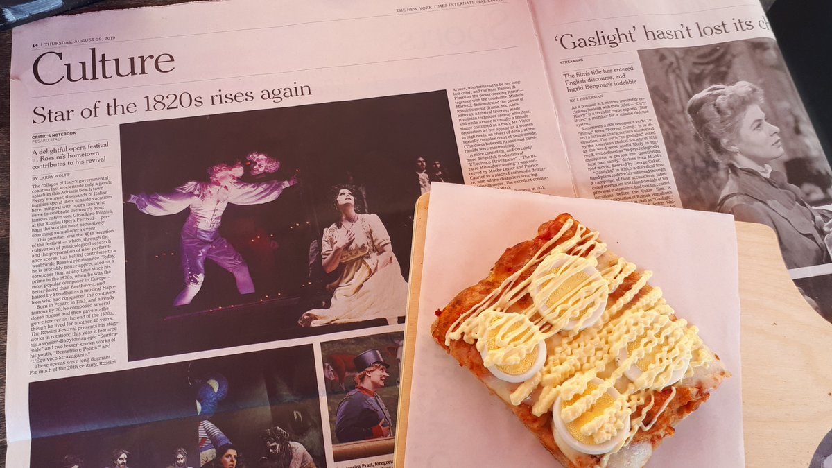 Rof_Pesaro's tweet photo. The article on the #ROFXL 2019 is also on today's International Edition of @nytimes: aperitif in piazza del Popolo reading the review by Larry Wolff. @comunepesaro @Rossini_150 https://t.co/yHCf4Enli6