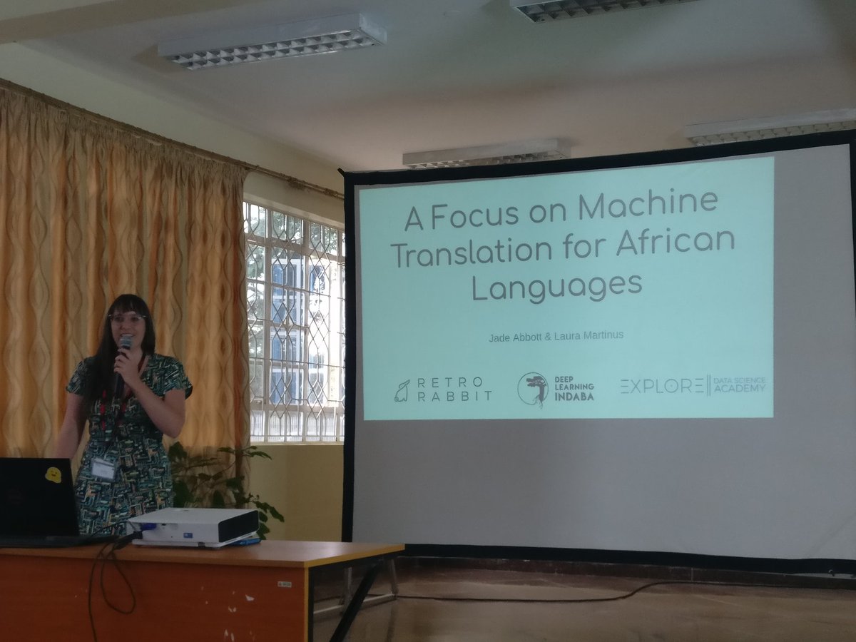 seb_ruder's tweet photo. In the second part of the NLP and speech processing session @DeepIndaba, @alienelf presents her journey and work on machine translation for African languages with @LauraMartinus 
#DLIndaba2019 https://t.co/8hpZofge3B