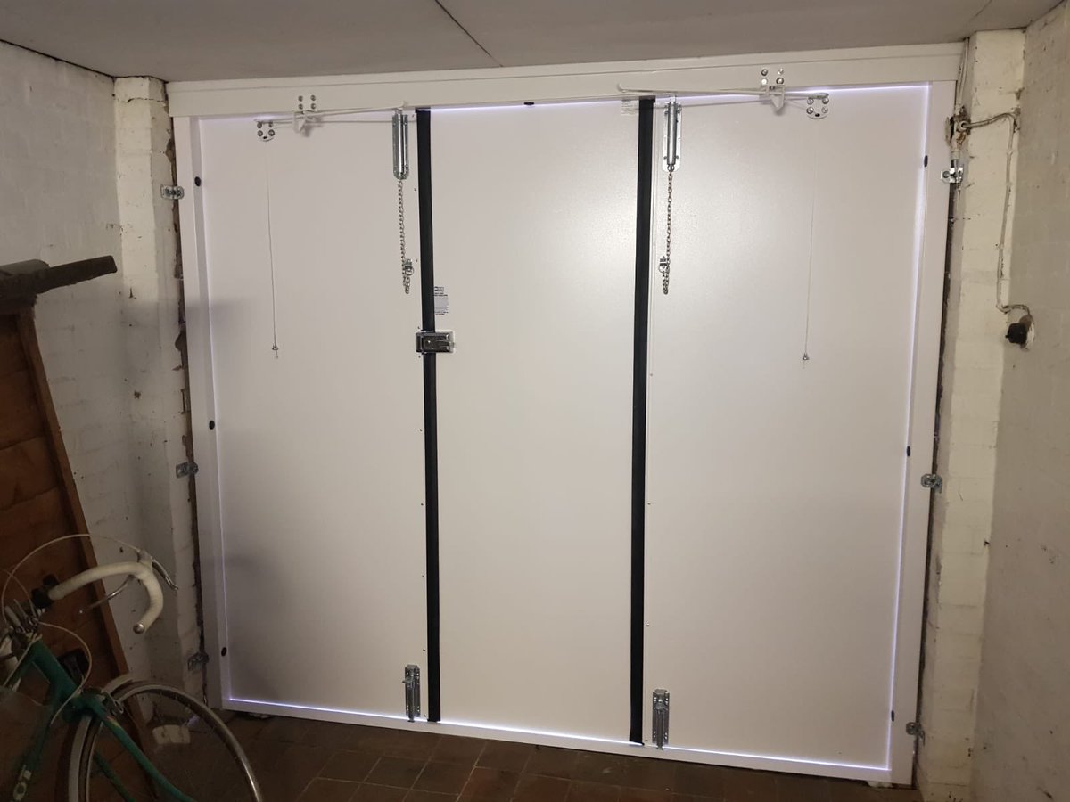 Steel side hinged garage door in white with new steel frame! Many other designs and colours available. Give us a call on 02476353002 for more info. nuneatongaragedoors.co.uk