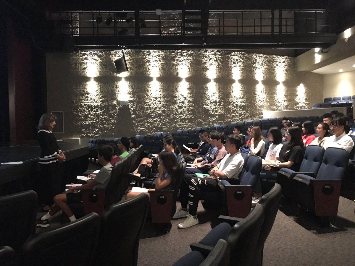StudyInHalton's tweet photo. Our new students being formally welcomed to the @HCDSB by our program Superintendent Toni Pinelli inside the beautiful theatre at @STAOakville #HCDSBwelcome #StudyHCDSB https://t.co/xvJmZDIjiX