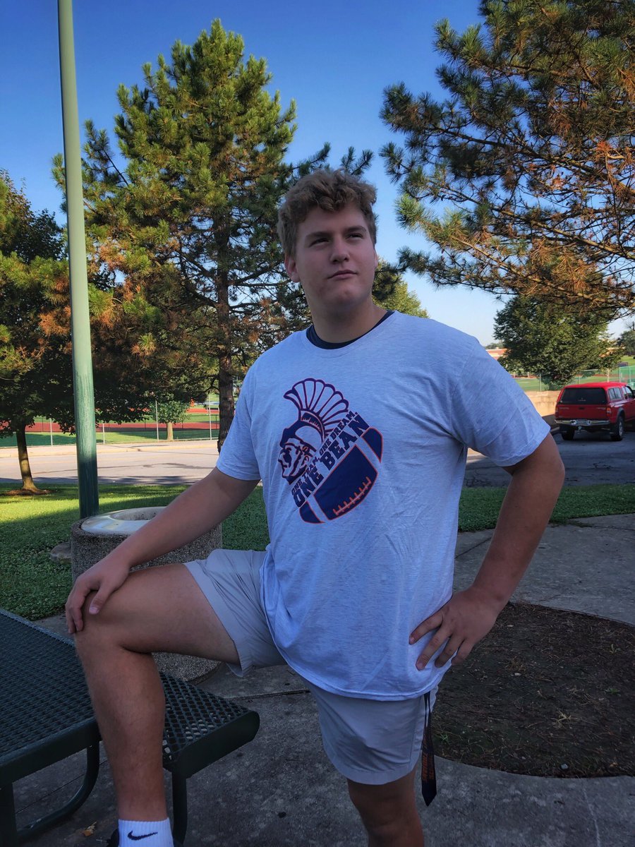 HHSTradingPost's tweet photo. Bean shirts are available now at all three lunches!! We hired Colin for his exclusive modeling services so please buy a shirt for $12!!🏈🔶🔷 https://t.co/ZyUl8x5FjQ